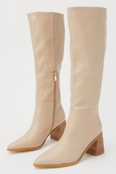 The best way to style the Billini Holden Biscuit Beige Pointed-Toe Knee-High Boots is with your favorite fall dress or a flirty mini skirt with tights! Faux pebbled leather shapes these super chic boots that feature a classy pointed-toe upper that rises to a 15.5"" knee-high shaft with a 10"" zipper at the instep and a 15"" circumference. A wood-look stacked block heel completes the trendy look! Available in whole sizes only. 3" wood-look stacked block heel. Lightly cushioned insole. Rubber sole Cream Knee High Boots Outfit, Mini Skirts With Tights, Cream Knee High Boots, Beige Knee High Boots, Pink Knee High Boots, Beige Boots Outfit, Classy Boots, Skirt With Tights, Thrift Board