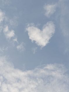 two hearts shaped clouds in the sky