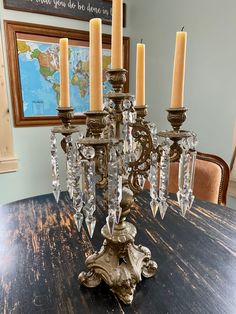 a chandelier sitting on top of a wooden table