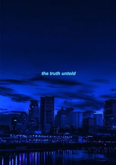 the words truth unto are lit up in front of a cityscape at night