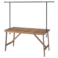 a wooden bench with two metal bars on the top and one is attached to it