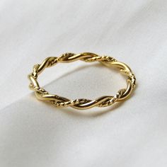 *18k gold plated stainless steel ring Currently available in 3 sizes! *US size 6 (Pandora 52, UK L - L 1/2) *US size 7 (Pandora 54, UK M 1/2 - N 1/2) *US size 8 (Pandora 57, UK P 1/2 - Q) Minimalist Twisted Gold Rings, Gold Twisted Stackable Jewelry, Gold Twisted Promise Ring, Twisted Gold Ring For Gift, Twisted 14k Gold Ring, Gold Stackable Rings With A Modern Twist For Promise, Yellow Gold Twisted Ring For Gift, Gold Midi Rings For Promise With Modern Twist, Twisted Yellow Gold Ring For Gift