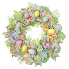 an easter wreath with colorful eggs and bows