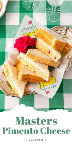 a plate with sandwiches on it and the words masters pimentoo cheese