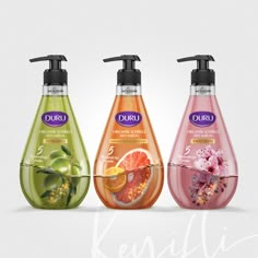 three different types of hand soaps with orange, grapefruit and kiwi