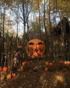 an image of pumpkins in the woods with text that reads, the griming raven manor