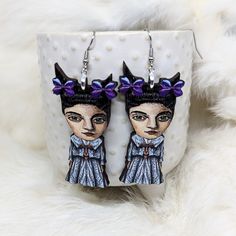 Goth Girl Earrings ~ Measures Approx. 2.25 ish inches ~ Stainless steel ear wires     ~ Made of lightweight wood ~ Laser cut with a matte glaze.   ~ Processing time is up to two weeks, may be sooner if item is currently in stock. Thanks! follow us @iamsonotcoolvintage on instagram  save 10% :) Hand Painted Earrings For Party, Hand Painted Party Earrings, Gothic Handmade Earrings For Party, Handmade Gothic Plug Earrings As Gift, Handmade Gothic Earrings For Party, Quirky Dangle Earrings For Party, Whimsical Handmade Earrings For Halloween, Whimsical Handmade Halloween Earrings, Whimsical Handmade Earrings For Party