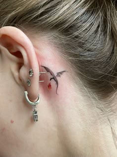 Fantasy Tattoos Ideas, Small Game Of Thrones Tattoo Ideas, Small Hand Dragon Tattoo, Ears Tattoo Ideas, Womens Tattoos Chest, Harry Potter Tattoos Behind Ear, Small Dainty Dragon Tattoo, Small Dragon Tattoo Behind Ear, Tiny Toothless Tattoo