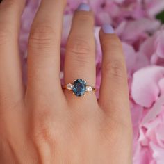 With a brilliant cut like that, this ring is nothing but pure brilliance in itself. With the prettiest blue color of the London Blue Topaz, the Khloe ring with two side moissanites, sparkles like there is no tomorrow. Celebrate your milestones or special occasions with this ring as the perfect gift for a new mom, or as Blue Oval Sapphire Ring For Proposal, Oval Blue Sapphire Ring For Proposal, Oval Blue Diamond Ring With Accent Stones, Oval Topaz And Diamond Proposal Ring, Blue Oval Diamond Ring For Proposal, Oval Blue Diamond Ring For Proposal, Fine Jewelry Oval Blue Topaz Diamond Ring, Oval Sapphire Ring For Promise, Fine Jewelry Blue Topaz Diamond Ring