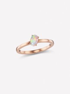 Opal Stacking Ring by J FINE with a 0.34ct cabochon white opal. 18K Pink Gold. As each Opal Stacking Ring is handmade with handset diamonds consistent with all pieces in the J FINE jewelry line, carat weight and stone quantity may vary slightly from piece to piece. If this product is sold out and you wish to order, contact us. To replenish our stock or create a custom order can take 5-6 weeks. Opal Stacking Ring, White Opal, Stacking Ring, Stacking Rings, Pink Gold, Fingerprint, Pink And Gold, Heart Ring, Natural Gemstones