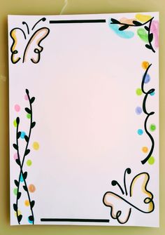 a white paper with colorful designs on it