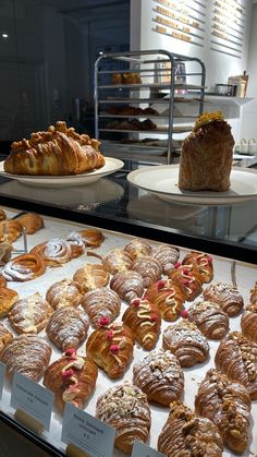 there are many different types of pastries on display