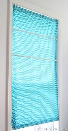 a window with blue and white polka dots on it