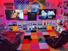 a living room filled with lots of furniture and colorful carpeted flooring on top of it