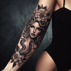 a woman's arm with flowers and an octopus tattoo on the left side of her body