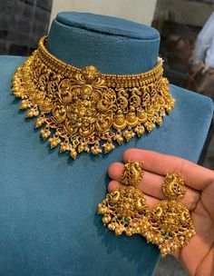 Traditional Indain chocker set, Kempu Choker set with matching earrings. Beautifully studded with ruby stones, Uncut stones and bunch of small pearls with green monnalisa beads hanggings. Temple Necklace set. Perfect choice for any Indian occasion(Marriages, Engagements, Functions, Festivals). This Necklace contains a  adjustable gold dori.  Earring Closure: Push back All International Shipments of our Jewelry is dispatched through either DHL or UPS and are delivered to your doorstep. Care: We d Indian Jewelry Sets Gold Antique, Luxury Traditional Temple Necklace For Navratri, Golden Choker Necklace Indian, Neck Choker Designs Gold, Gold Chockers, Gold Choker Necklace Indian, Secret Rings, Temple Jewellery Set, Temple Necklace