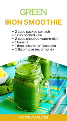 a green smoothie is in a mason jar