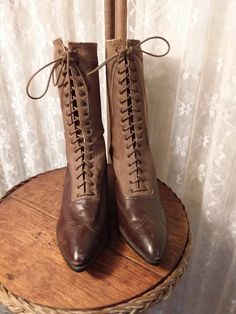 Women's Victorian shoes Ca 1900's Brown leather and tan canvas uppers 16 hole lace up high tops 1.75' stacked heels Foot Schulze Co., Saint Pauls Excellent condition I have been collecting vintage and antique clothing and accessories for 35 years and have decided it is time to downsize. I will be posting items from my inventory and my personal collection. If you have a particular area of interest please let me know. Judi Vintage Lace-up Boots With Brogue Detailing, Vintage Lace-up Boots With Pointed Toe And Leather Sole, Vintage Lace-up Boots With Leather Sole For Formal Occasions, Vintage Fitted Boots With Laces, Vintage Leather Wingtip Boots, Vintage Formal Boots With Laces, Vintage Wingtip Boots With Leather Lining, Vintage Brogue Lace-up Boots, Vintage Lace-up Boots For Formal Occasions