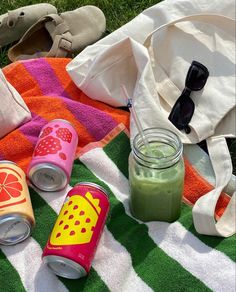 some drinks are sitting on a towel and towels