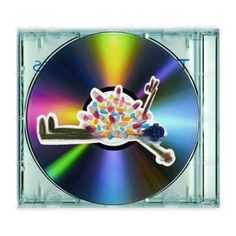 a cd with a bunch of keys on it and some candy in the middle,