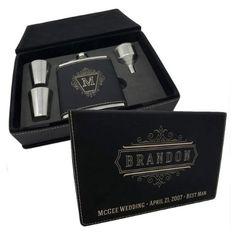 two flasks in a gift box with the name brandon written on it and an engraved flask