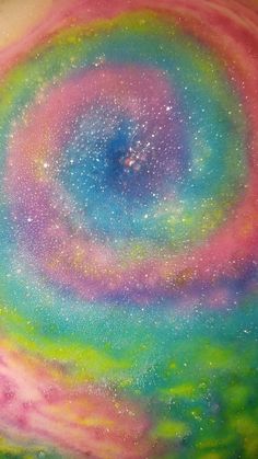 an abstract painting with stars and colors in the center, as if it were painted on paper