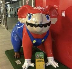 an inflatable statue of a mario bros character