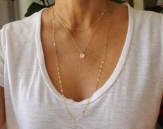 "The Perfect Long Layering Necklace! This elegant necklace is made with a delicate 14k gold filled or sterling silver flattened chain for extra shine. It is made 44\" long so it wraps easily two or even three times! It looks great layered as shown with our tiny hammered disk necklace. (you can find this and many other sets at a discounted price in my Layered Sets section) It won't be long before it is your favorite go to necklace! *If you think you need this necklace longer for the triple wrap, Tiny Gold Necklace, Necklaces Layering, Double Circle Necklace, Disk Necklace, Tiny Necklace, Two Necklaces, Gold Disc Necklace, Karma Necklace, Faceted Bead Necklace