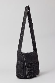 Essential messenger bag crafted from premium BDG denim. Low-profile silhouette with a pocketed flap closure. Lined interior with two pockets and plenty of space for your essentials. Complete with a zip pocket at the back for easy access, plus a water bottle pocket at the side. Finished with an adjustable strap - wear it on your shoulder or crossbody. Urban Outfitters exclusive. Features BDG denim messenger bag Washed soft denim with tons of storage Plenty of pockets inside and out Water bottle p Homemade Crossbody Bag, Y2k Cross Body Bag, 90s Messenger Bag, Across The Body Bags, Cool Crossbody Bags, Goth Messenger Bag, Streetwear Canvas Bags With Pockets, Black Denim Travel Bag, Black Denim Travel Shoulder Bag