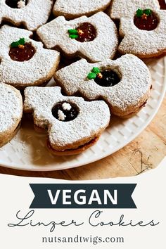 plate of christmas shaped vegan linzer cookies. Home Cooking