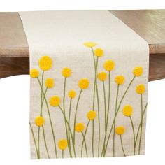 a table runner with yellow flowers on it