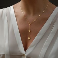 "✨Don't Forget Your Free Custom Star Map! Just provide a special date, location, names, and a personal message in the personalization box to receive a unique star map. Perfect for commemorating any cherished moment.🌌 Discover elegance and romance with our exquisite 14K Solid Gold Heart Necklace, a perfect Valentine's Day gift for her. This stunning lariat necklace, also available in 925 Sterling Silver, is designed for the modern woman who appreciates timeless style and quality. Featuring six d Location Names, Small Heart Necklace, 6th Anniversary Gifts, Gold Lariat Necklace, Christmas Gifts For Wife, 6th Anniversary, Necklace Love, Y Necklace, Necklace Layering