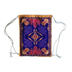 a blue and red bag with an intricate design on the front, hanging from a string