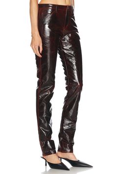 Self: 80% cotton 20% polyurethane, Lining: 100% cotton.  Made in Ukraine.  Hand wash.  Zip fly with button closure.  5-pocket design.  Faux patent leather fabric.  Item not sold as a set.  .  .  .  .  .  .  .  .  . Trendy Fitted Leather Pants With Button Closure, Fitted Leather Pants With Button Closure, Fitted Faux Leather Straight Leg Jeans, Fitted Faux Leather Jeans For Work, Fitted Straight Leg Faux Leather Jeans, Designer Fitted Bottoms For Fall, Classic Fitted Leather Pants With Five Pockets, Fitted Leather Jeans For Fall, Fall Fitted Jeans With Snap Buttons