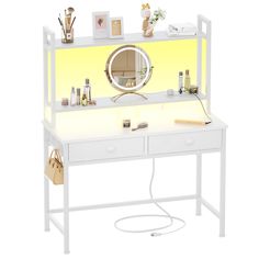 a white desk with a mirror and various items on it