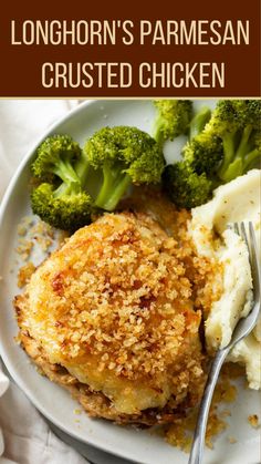 a plate with chicken, mashed potatoes and broccoli covered in parmesan