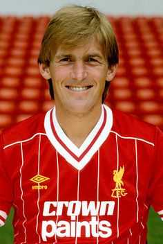 liverpool united's new signing player john mca poses for a photo in the stands at anfield