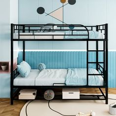 a bunk bed sitting on top of a hard wood floor next to a white rug