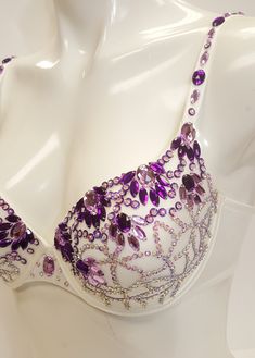 Beautifully hand decorated beaded push up bra in ivory combination decorated with purple gems in assorted colors and sequins. *Individually hand decorated. *Perfect for any occasion. *Lightweight, very comfortable to wear. *Floral design decoration. *Available in multiple US sizes. *2 hooks-eye position at the back for better fitting. *Adjustable shoulder straps. *Free USPS First Class shipping within the US. Shipping upgrade available. *Items located in the US meaning fast order processing/hand Decorated Bras Diy, Bedazzled Bra Diy, Bra Decorating Ideas, Rhinestone Bra Diy, Bedazzled Bra, Decorated Bras, Bra Art, Rave Bras, Bling Bra