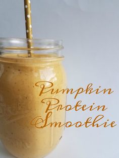 pumpkin protein smoothie in a mason jar with a straw