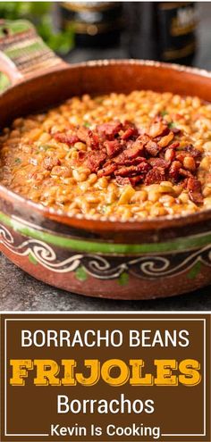 a bowl filled with beans and bacon on top of a table