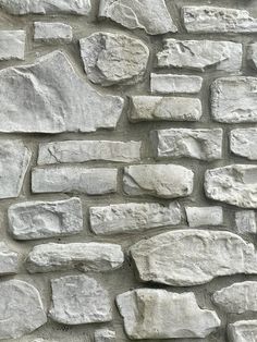 an image of a stone wall that looks like it is made out of cement