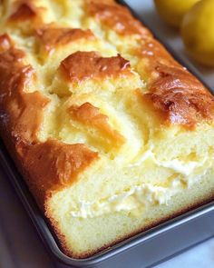 a loaf of lemon bread sitting on top of a pan