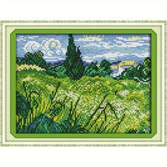 a cross stitch picture with grass and clouds in the background