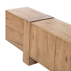 the sideboard is made from wood and has two drawers on one end, and an open drawer on the other