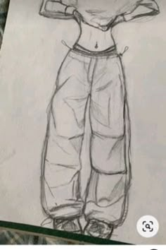 a drawing of a person's shirt and pants, with the bottom half drawn