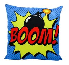 a pillow with the word boom on it and an image of a bowling ball in comic style