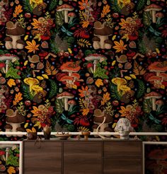 the wallpaper has mushrooms and leaves on it