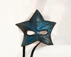 BLUE STAR LEATHER MASK This item is available to order. Please allow three weeks before shipping. Wearable star mask with black cotton laces. Our masks are made entirely by hand, all in genuine leather and wearable. The masks are designed not only as art objects, but also to be worn. Thanks to our special process the leather retains its elasticity allowing a good fit of the mask. The leather we luse is tanned using vegetable products. The casts of which are shaped masks are in clay and its are d Mardi Gras Halloween Costume, Maid Halloween, Dark Costumes, Mermaid Halloween Costumes, Pagan Magic, Halloween Costumes 2016, Masquerade Theme, Mask Shapes, Mermaid Halloween