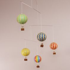 multicolored hot air balloons hanging from the ceiling